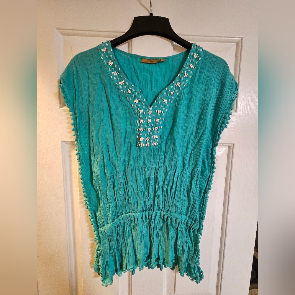 Valarie Steven's Teal blouse with beading